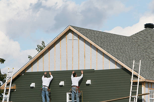 Professional Siding Replacement technician working in Brookline, MA